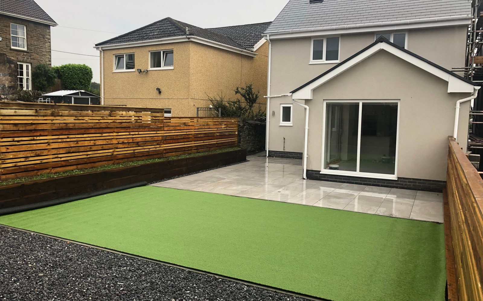 A finished new-build home with a landscaped garden