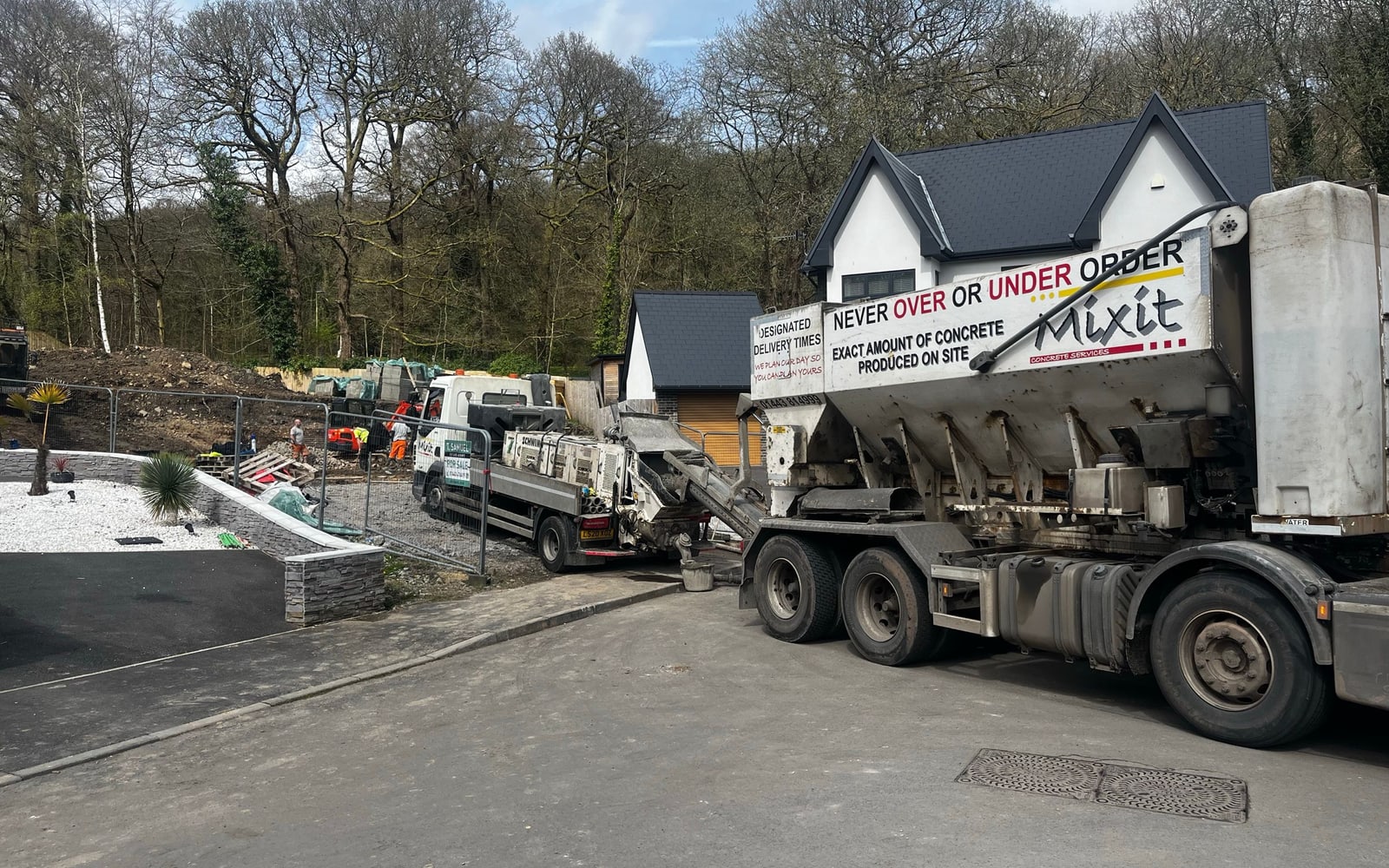 A new-build home at Trem Duf with a concrete wagon on site